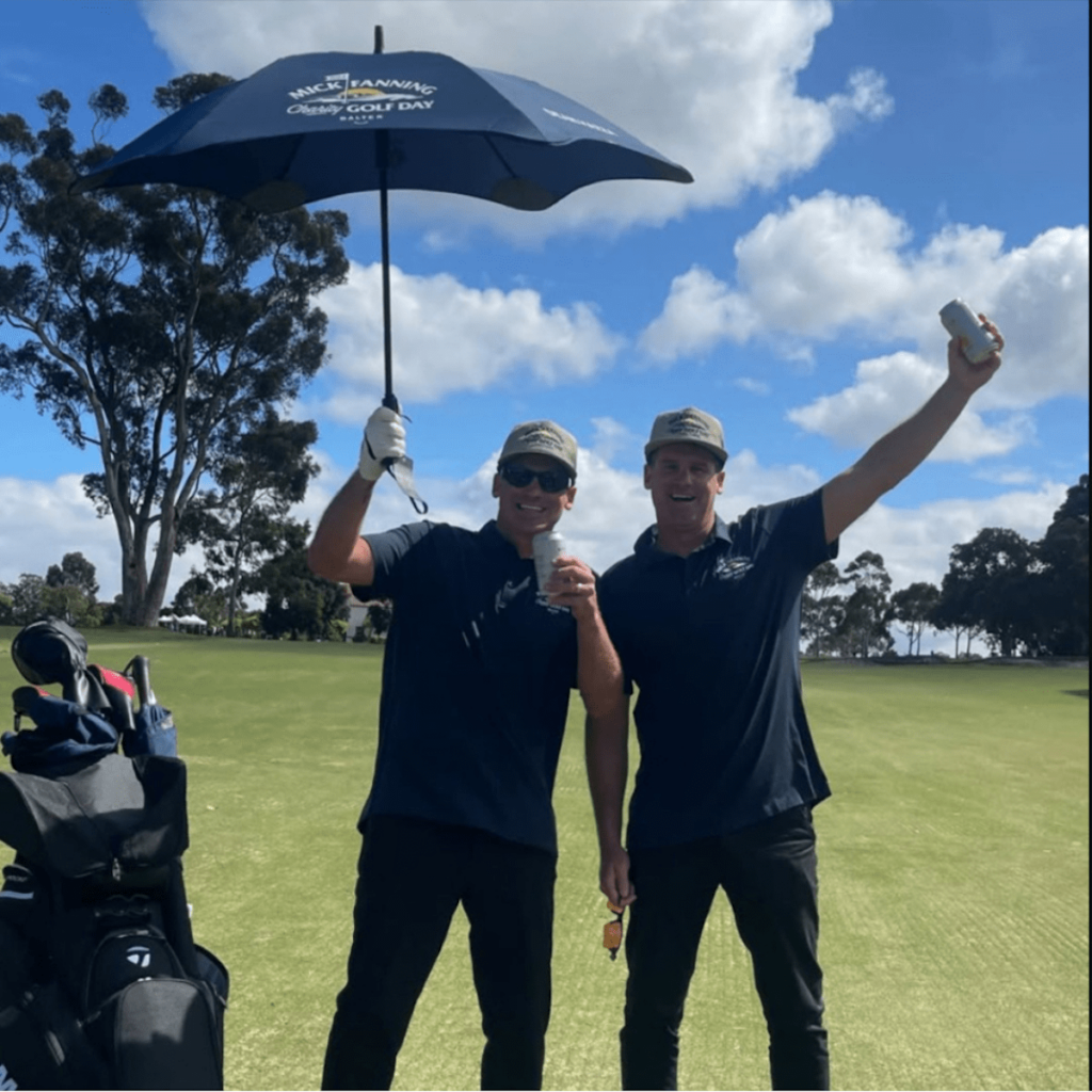 Mick Fanning branded umbrellas for golf event